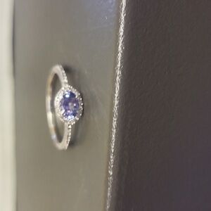 Micheal Hill 10k white gold, diamonds and tanzanite size 7 and a half.